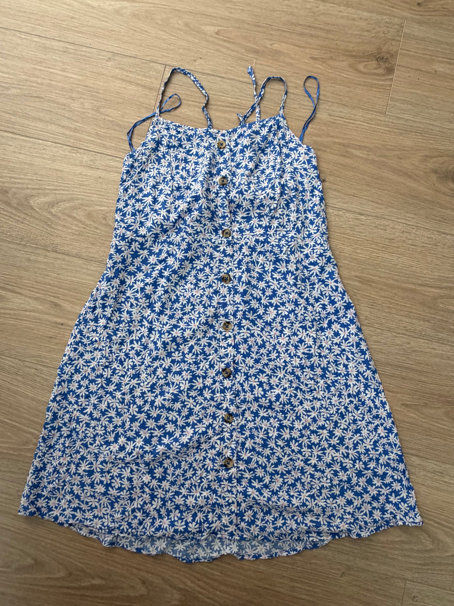 Robe bleue fleurie à bretelles nouées – Taille S