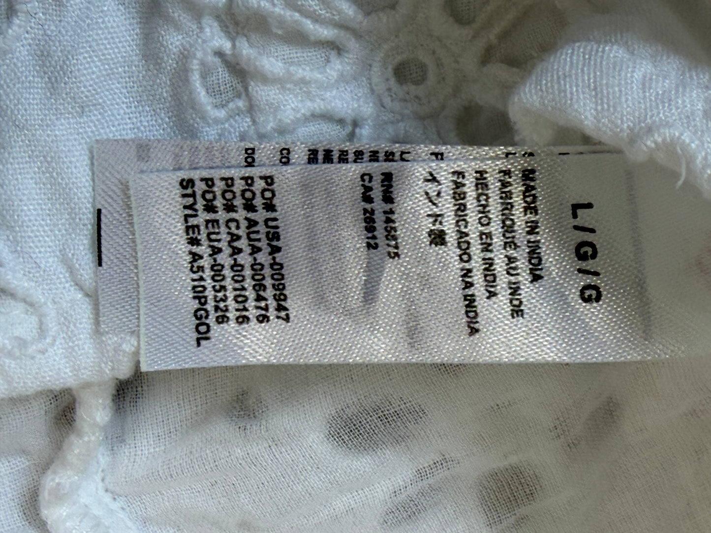 Blouse courte en broderie anglaise blanche à manches bouffantes – Taille L